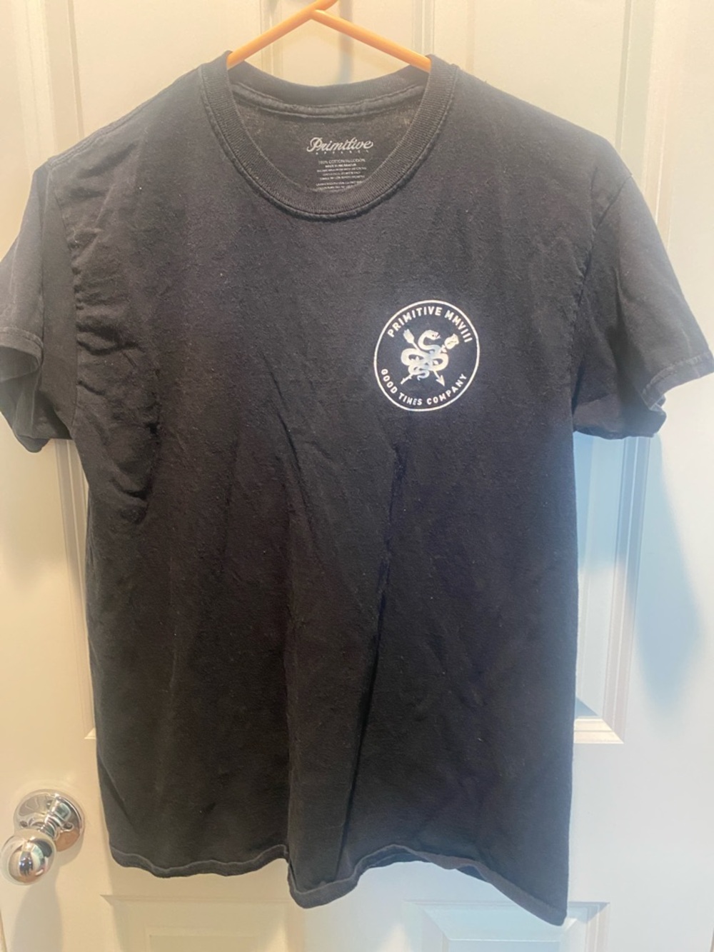 Primitive Black Tee with White Circular Logo